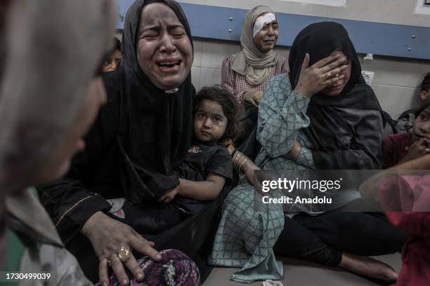 Injured Palestinians taken to Al-Shifa Hospital following an explosion at Al-Ahli Baptist Hospital in Gaza City, Gaza on October 17, 2023. Over 500...