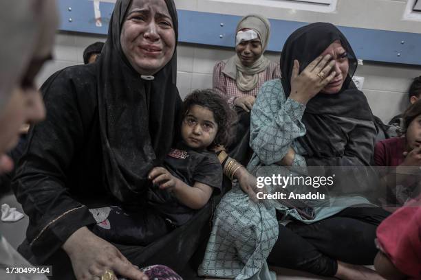 Injured Palestinians taken to Al-Shifa Hospital following an explosion at Al-Ahli Baptist Hospital in Gaza City, Gaza on October 17, 2023. Over 500...