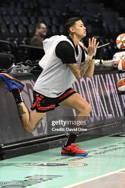 Kierstan Bell of the Las Vegas Aces stretches during practice and media availability at the 2023 WNBA Finals on October 17, 2023 in Brooklyn, New...