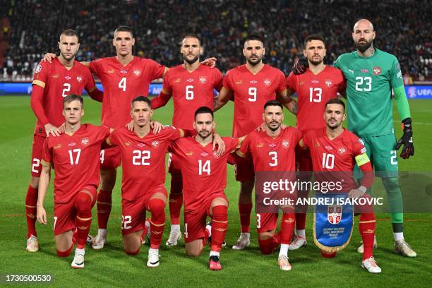 Serbia's players pose for a team photo during the UEFA Euro 2024 Group G qualifying football match between Serbia and Montenegro, at the "Rajko...