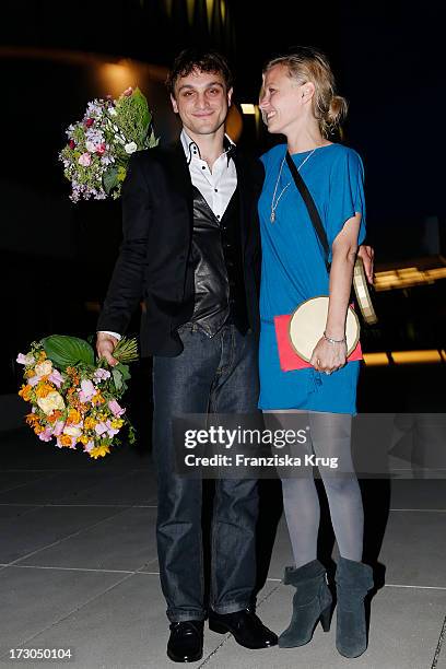 Franz Rogowski and Lana Cooper attend the Munich Film Festival 2013 - 'Foerderpreis Neues Deutsches Kino' at BMW Museum on July 05, 2013 in Munich,...