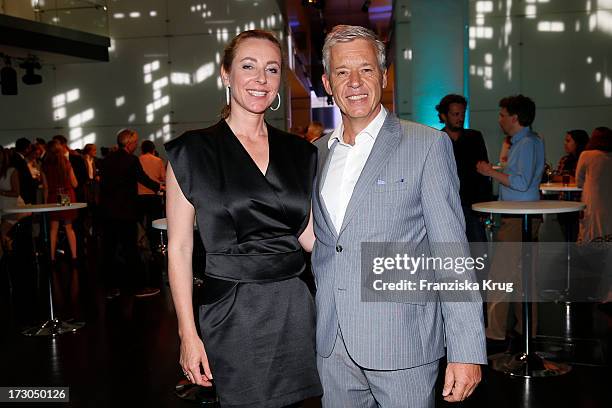 Diana Iljine and Ulrich Knieps attend the Munich Film Festival 2013 - 'Foerderpreis Neues Deutsches Kino' at BMW Museum on July 05, 2013 in Munich,...