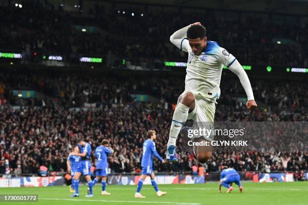 England's midfielder Jude Bellingham celebrates following his team second goal scoreds by England's striker Marcus Rashford during the Euro 2024...