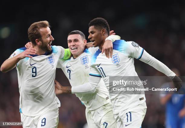 England's Marcus Rashford celebrates scoring his side's second goal with Harry Kane and Phil Foden during the UEFA EURO 2024 European qualifier match...