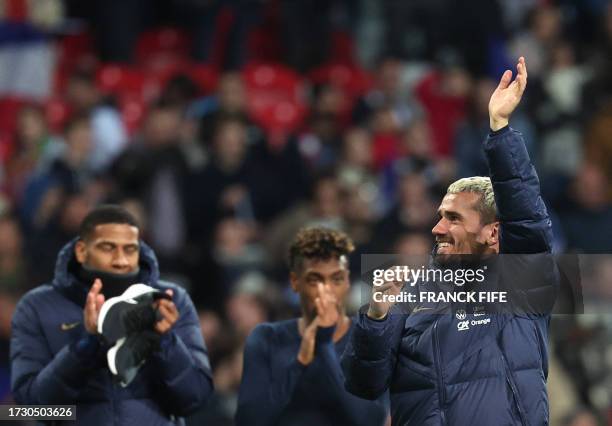 France's forward Antoine Griezmann celebrates after winning the friendly football match between France and Scotland at Pierre-Mauroy stadium, in...