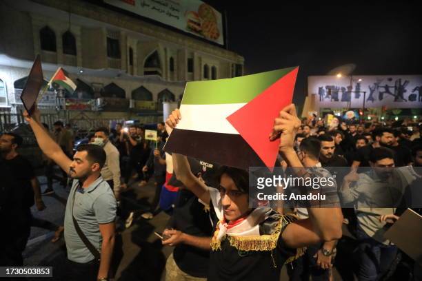 People gather in Tahrir Square to protest following an explosion at Al-Ahli Baptist Hospital in Gaza on Tuesday as Israeli attacks continue on its...