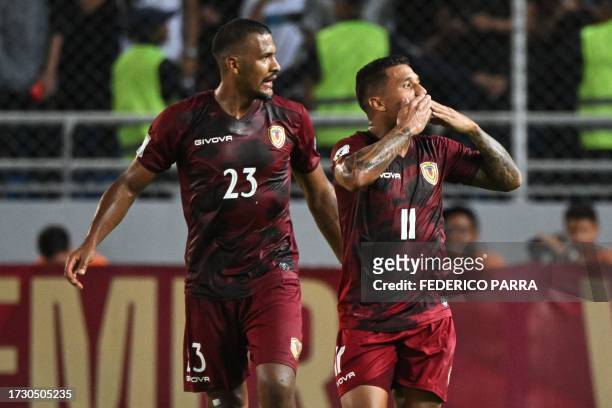 Venezuela's forward Darwin Machis celebrates next to forward Salomon Rondon after scoring during the 2026 FIFA World Cup South American qualification...