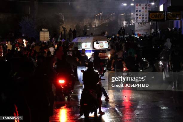 Protesters clash with Lebanese security forces on October 18 outside the US Embassy during a demonstration in solidarity with the people of Gaza in...