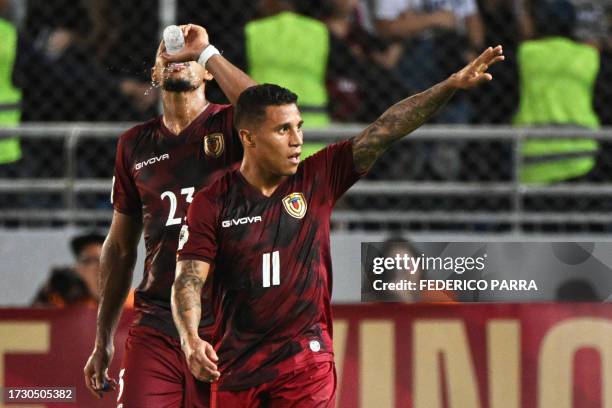 Venezuela's forward Darwin Machis celebrates next to forward Salomon Rondon after scoring during the 2026 FIFA World Cup South American qualification...