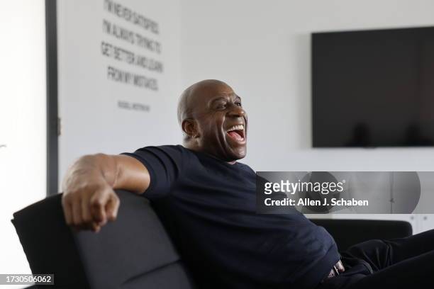 Los Angeles, CA Lakers legend Earvin "Magic" Johnson talks to a Los Angeles Times reporter during an interview before he and GSK were joined by...