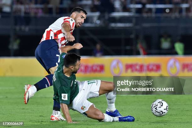 Paraguay's forward Gabriel Avalos and Bolivia's midfielder Danny Bejarano fight for the ball during the 2026 FIFA World Cup South American...