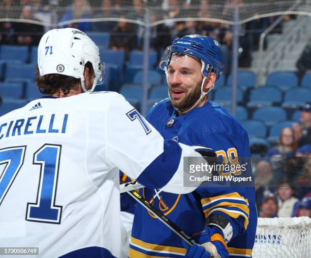 Zemgus Girgensons of the Buffalo Sabres has words with Anthony Cirelli of the Tampa Bay Lightning during an NHL game on October 17, 2023 at KeyBank...