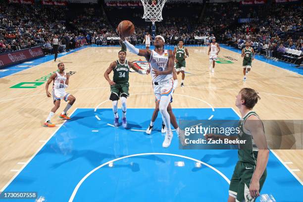 Shai Gilgeous-Alexander of the Oklahoma City Thunder shoots the ball during the game against the Milwaukee Bucks on October 17, 2023 at Paycom Center...