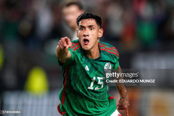 Mexico's forward Uriel Antuna celebrates scoring his team's first goal during the international friendly football match between Germany and Mexico at...