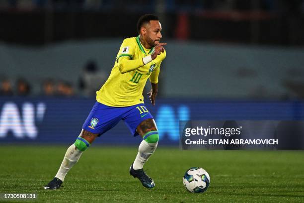 Brazil's forward Neymar controls the ball during the 2026 FIFA World Cup South American qualification football match between Uruguay and Brazil at...
