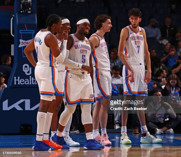 Luguentz Dort of the Oklahoma City Thunder smiles during the game against the Milwaukee Bucks on October 17, 2023 at Paycom Center in Oklahoma City,...