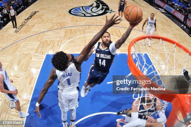 Brandon Ingram of the New Orleans Pelicans drives to the basket during the game against the Orlando Magic on October 17, 2023 at Amway Center in...