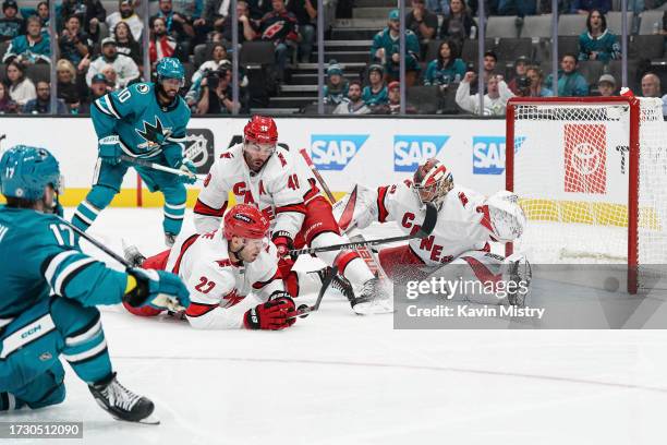 Antti Raanta of the Carolina Hurricanes makes a save in the second period against the San Jose Sharks at SAP Center on October 17, 2023 in San Jose,...
