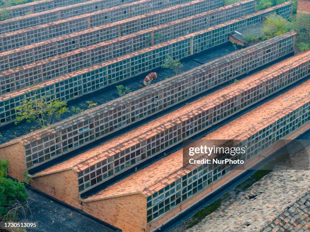 Aerial photo taken on October 18, 2023 shows the old factory buildings of Huaiyin Second Cotton Textile Factory, which has been abandoned for...