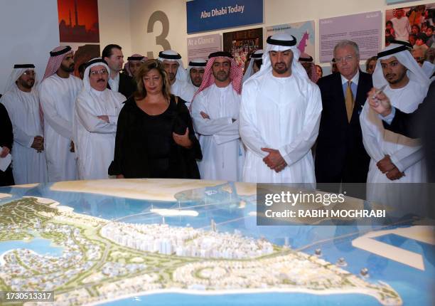 Crown Prince of Abu Dhabi Sheikh Mohammed bin Zayed al-Nahayan looks at the project model for Saadiyat Island with Iraqi-born British architect Zaha...