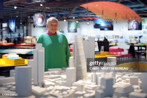 British architect Richard Rogers, one of the two architects of the French cultural Centre "Georges Pompidou" poses with the model of his project for...