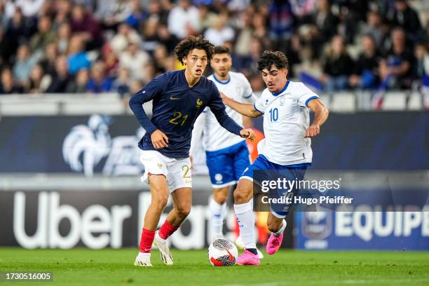 Maghnes AKLIOUCHE of France and Antonio FOTI of Cyprus during the 2025 EURO Under-21 qualifying match between France and Cyprus at Stade des Alpes on...