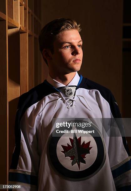 Joshua Morrissey, 13th pick overall by the Winnipeg Jets, poses for a portrait during the 2013 NHL Draft at Prudential Center on June 30, 2013 in...