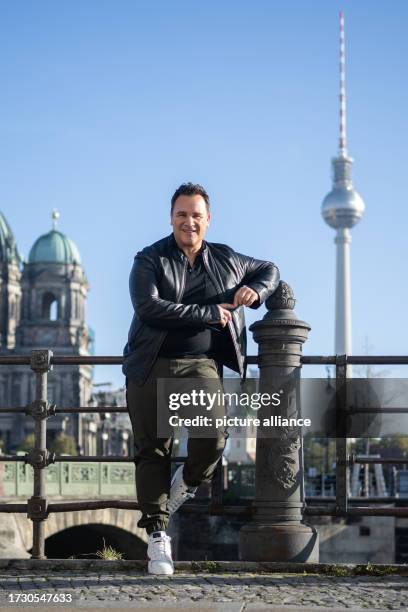October 2023, Berlin: Fashion designer Guido Maria Kretschmer stands on Berlin's Museum Island. Kretschmer's book "19521 Steps" will be published on...