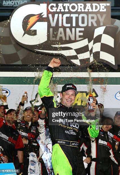 Matt Kenseth, driver of the GameStop Toyota , celebrates with his crew in victory lane after he won the NASCAR Nationwide Series Subway Firecracker...