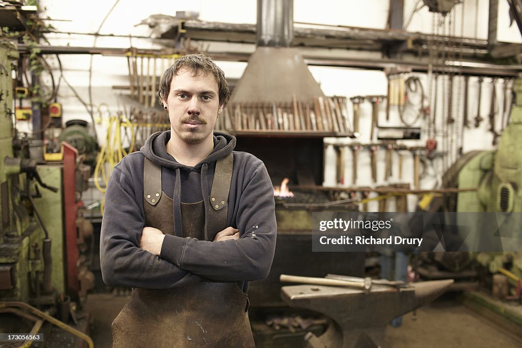 Blacksmith in his forge