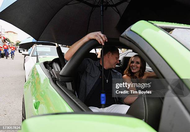 Nik Wallenda and his wife Erendira talk in the car while serving as the honorary grand marshal of the Suncoast Super Boat Grand Prix Festival Parade...