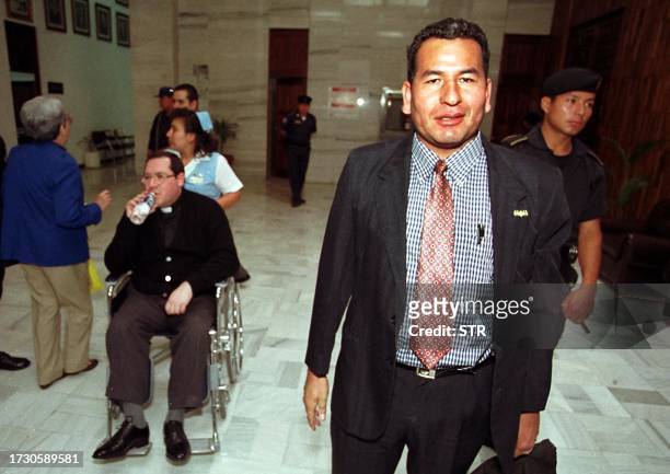 Sergeant major Obdulio Villanueva exits court with Father Mario Orantes , Guatemala City, Guatemala, 07 June 2001. Both defendants were convicted of...