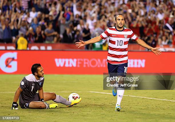 Landon Donovan of the USA celebrates after converting a penalty kick, as goalkeeper Ricardo Jerez of Guatemala looks on in the second half at...