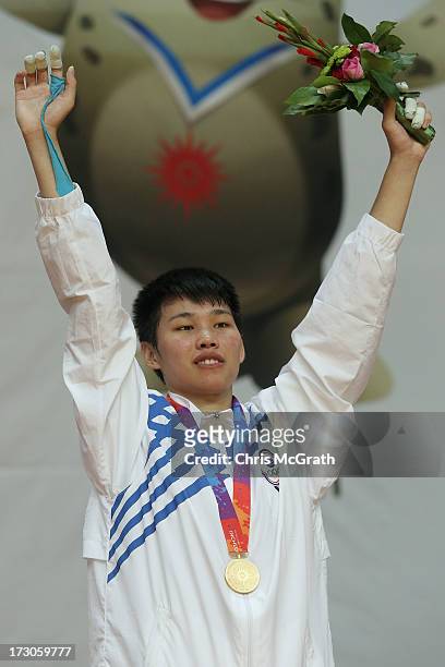 Su Shih Lin of Chinese Taipei celebrates after receiving her gold medal during the victory ceremony for the Kurash Women's -63 kg Final at Ansan...