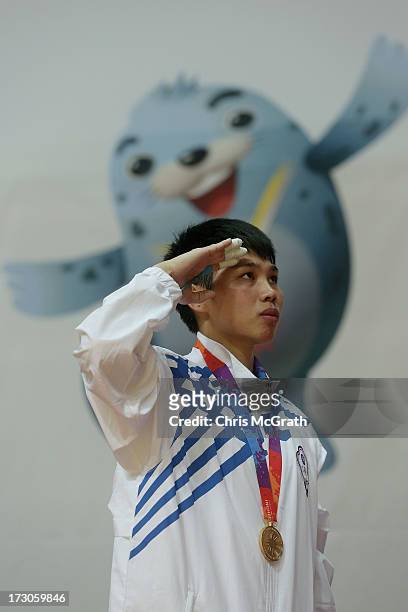 Su Shih Lin of Chinese Taipei listens to the national anthem during the victory ceremony for the Kurash Women's -63 kg Final at Ansan Sangnoksu...
