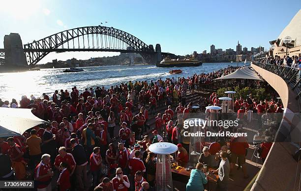 Lions fans gather as they show their support for the team on the shore of Sydney Harbour prior to the International Test match between the Australian...