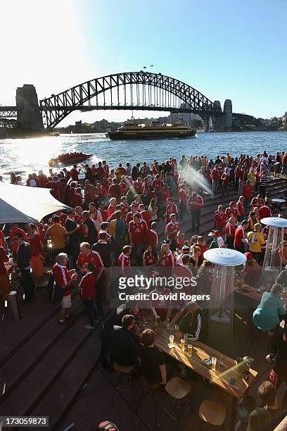 Lions fans gather as they show their support for the team on the shore of Sydney Harbour prior to the International Test match between the Australian...