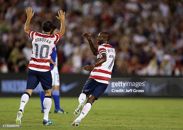 Landon Donovan and DaMarcus Beasley of the USA celebrate Donovan's goal against Guatemala in the second half at Qualcomm Stadium on July 5, 2013 in...