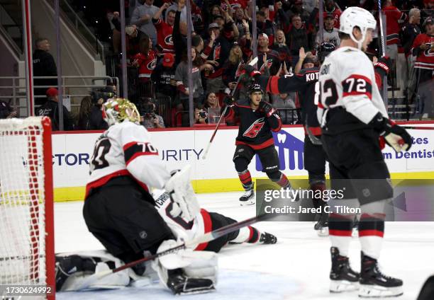 Teuvo Teravainen of the Carolina Hurricanes celebrates following a goal scored during the second period of their game against the Ottawa Senators at...