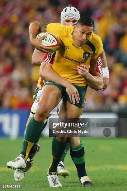 Israel Folau of the Wallabies is tackled during the International Test match between the Australian Wallabies and British & Irish Lions at ANZ...