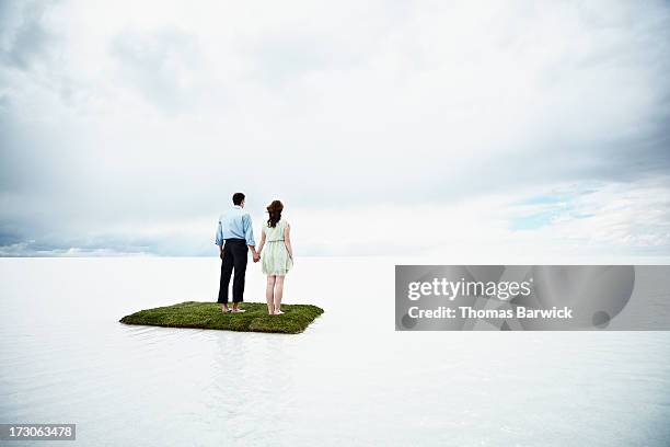 couple on small island in large body of water - socorro island imagens e fotografias de stock