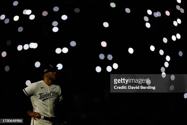 Carlos Correa of the Minnesota Twins looks on during a pitching change in the eighth inning against the Houston Astros in Game Four of the Division...
