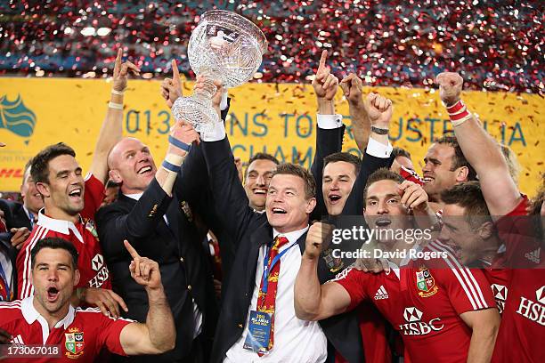 Brian O'Driscoll and Paul O'Connell of the Lions raise Tom Richards Cup after their victory during the International Test match between the...