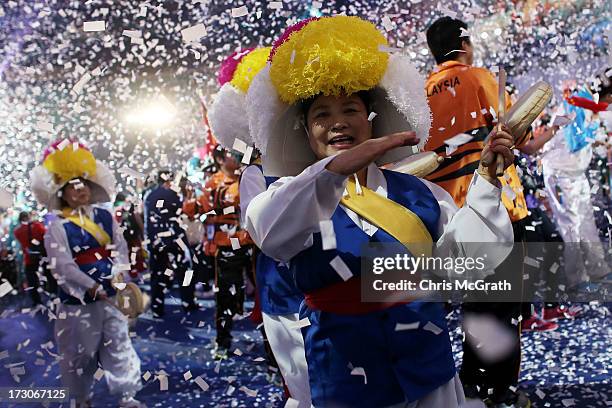 Performers, athletes and volunteers dance and celebrate at a concert during the closing ceremony of the 4th Asian Indoor & Martial Arts Games at...