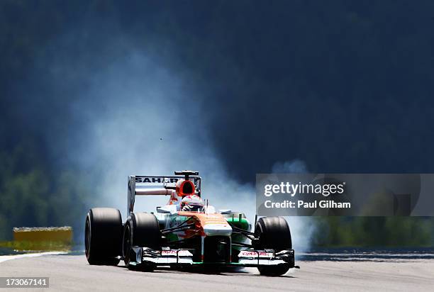 Paul di Resta of Great Britain and Force India drives during qualifying for the German Grand Prix at the Nuerburgring on July 6, 2013 in Nuerburg,...