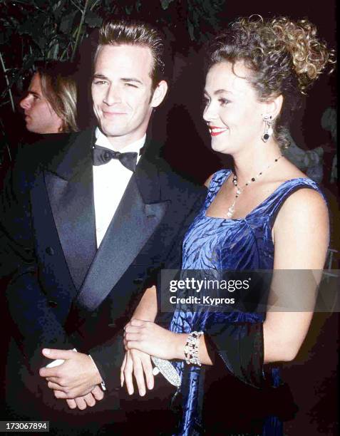 American actor Luke Perry and his partner Minnie Sharp at the 1992 Carousel of Hope Ball, Beverly Hilton Hotel, Beverly Hills, 2nd October 1992.