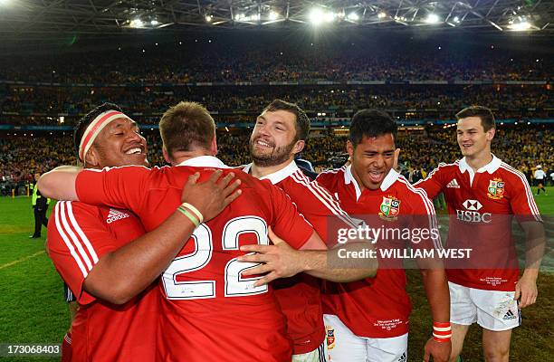 British and Irish Lions players Mako Vunipola , Owen Farrell , Alex Corbisiero , Manu Tailagi and Jonathon Sexton celebrate after the Lions defeated...