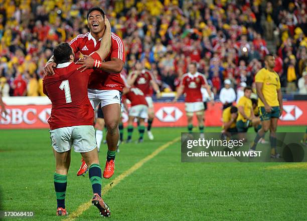 British and Irish Lions players Alex Corbisiero and Manu Tailagi celebrate after the Lions defeated the Australian Wallabies in the third rugby Test...