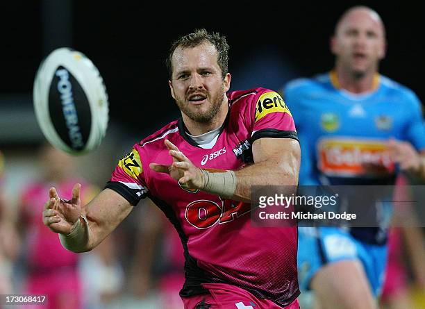 Clint Newton of the Panthers passes the ball during the round 17 NRL match between the Gold Coast Titans and the Penrith Panthers at TIO Stadium on...