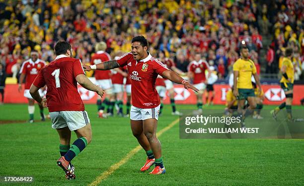 British and Irish Lions players Alex Corbisiero and Manu Tailagi celebrate after the Lions defeated the Australian Wallabies in the third rugby Test...